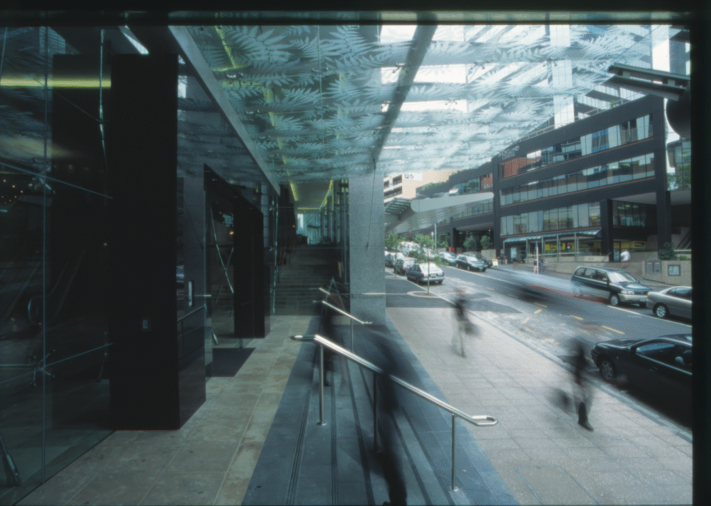 Street-side view featuring sandblasted glass entrance canopy at RSA / Vero offices